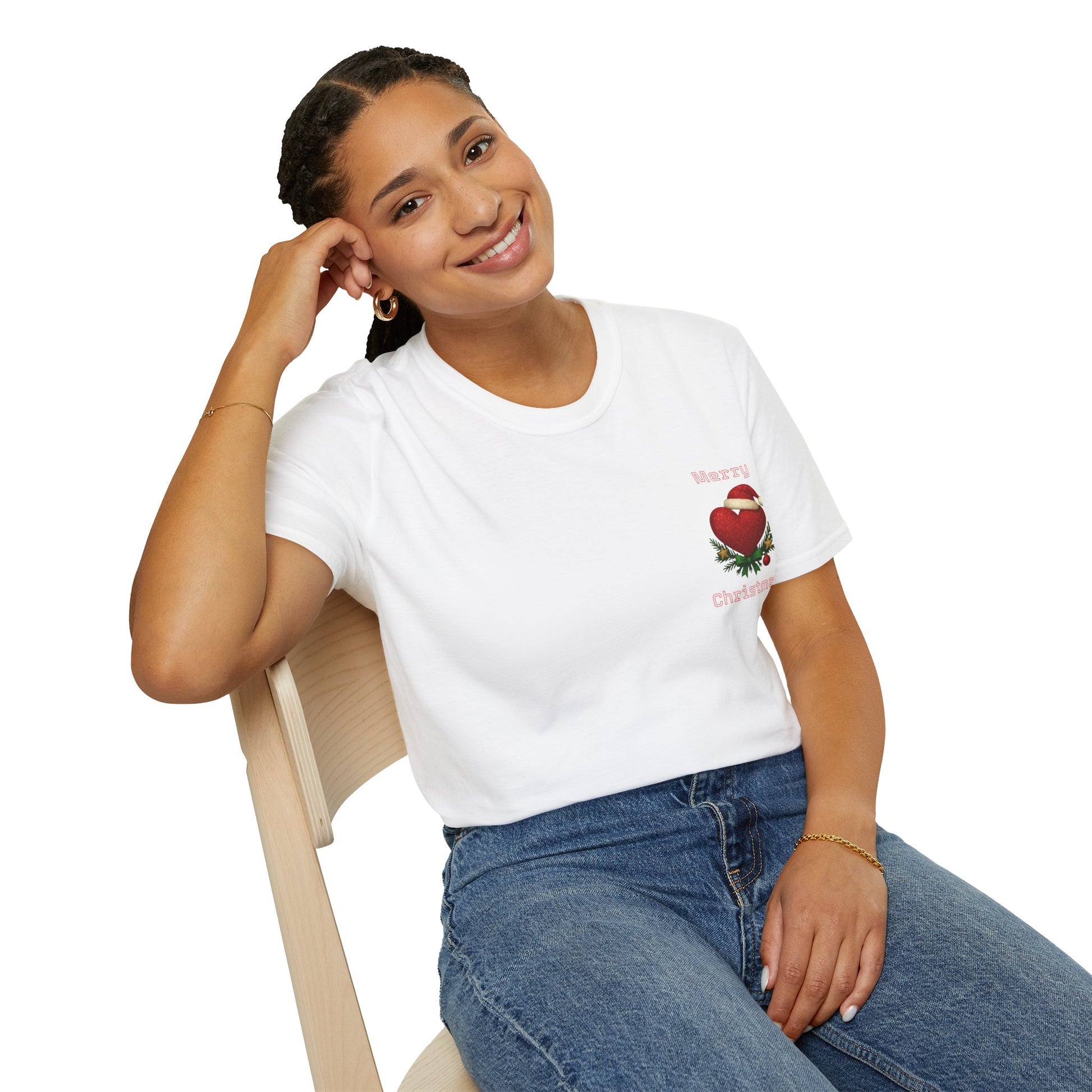 Woman wearing a white t-shirt with a red heart design, sitting on a chair against a white background