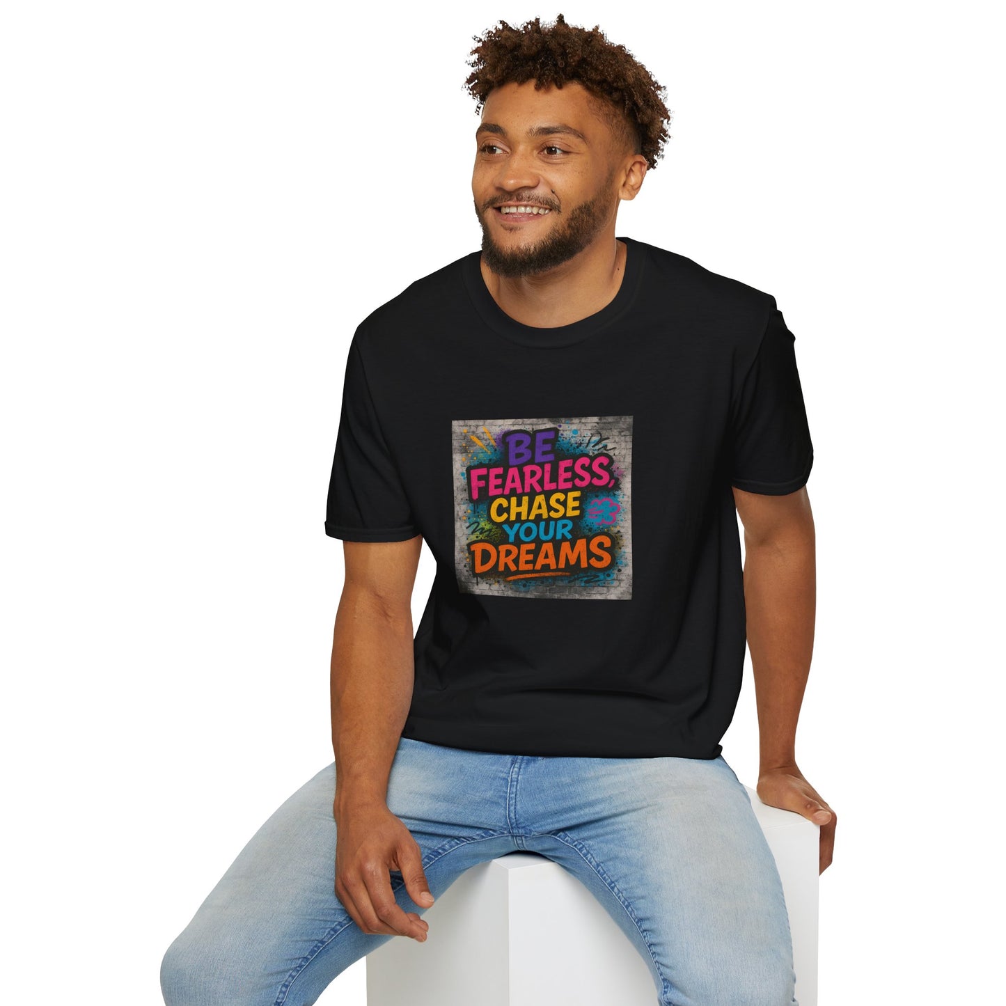 Man wearing a black t-shirt with colorful text design on a white background