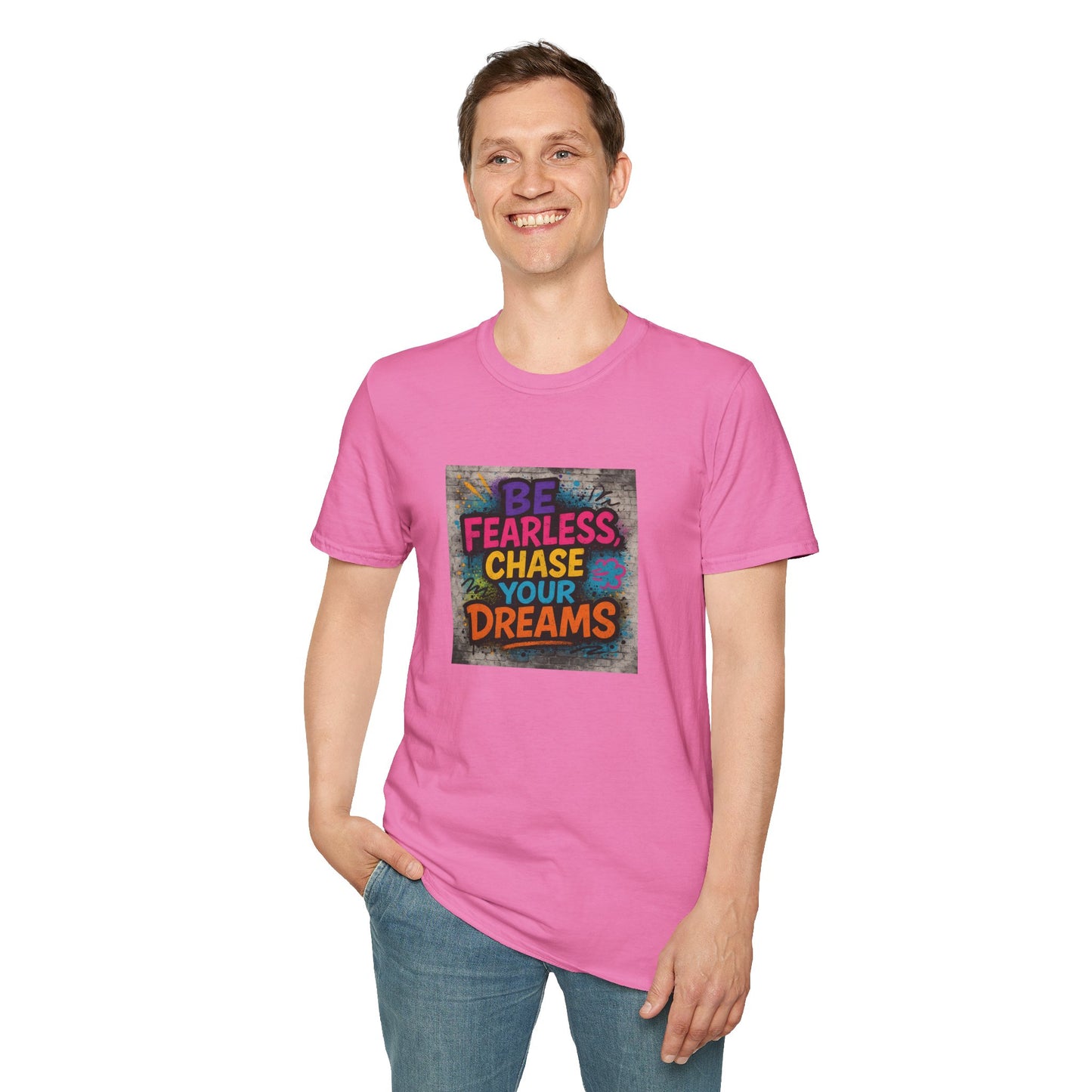 Person wearing a pink t-shirt with 'Be Fearless, Chase Your Dreams' text on a white background