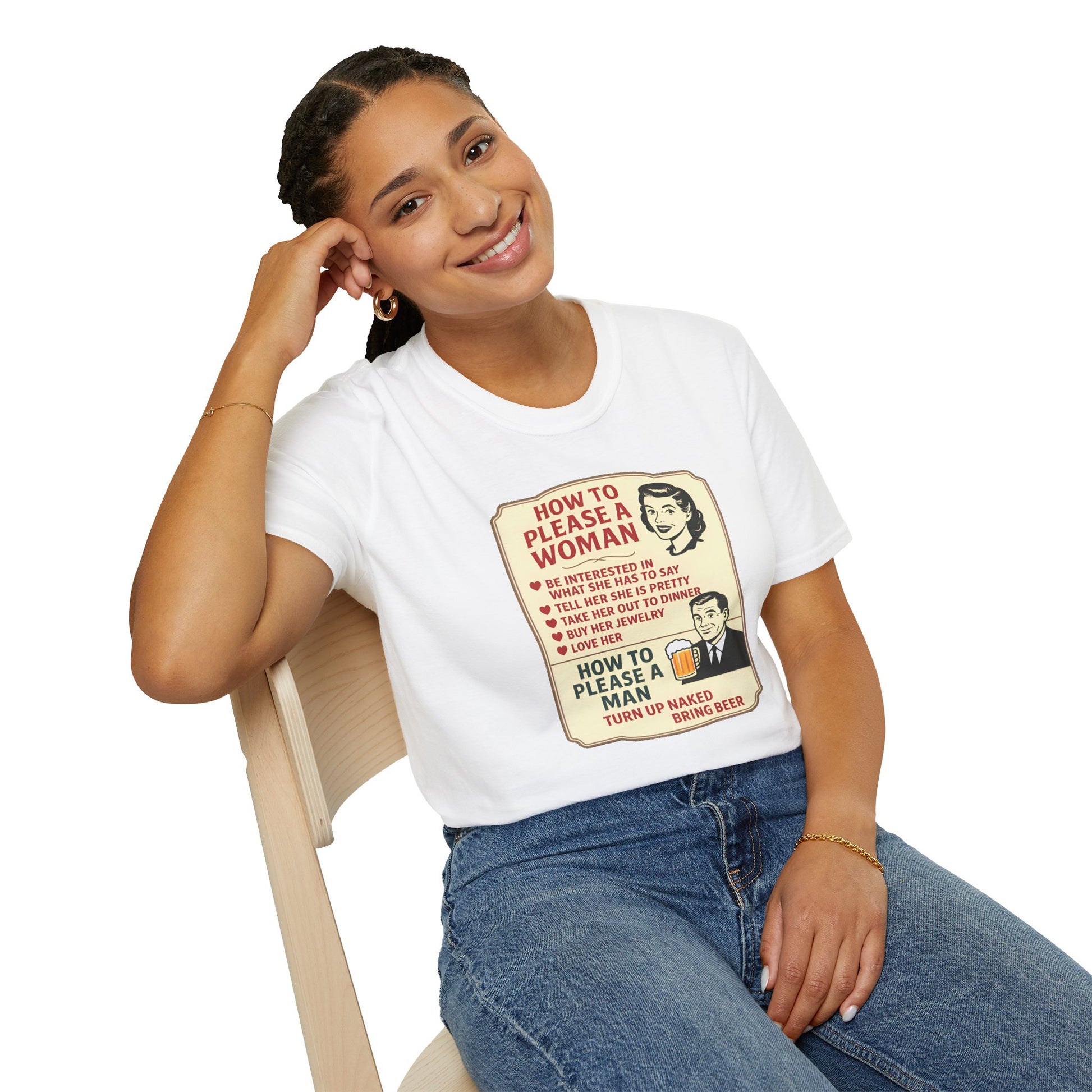 Person wearing a white t-shirt with a graphic design sitting on a chair.