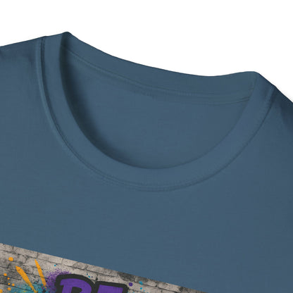 Close-up of a blue t-shirt with a colorful graphic design on a white background