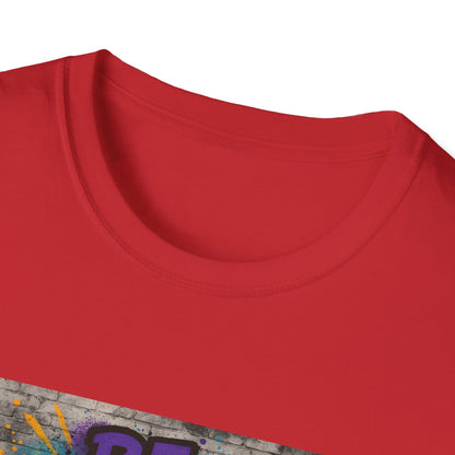 Close-up of a red t-shirt with a colorful graphic design on a white background