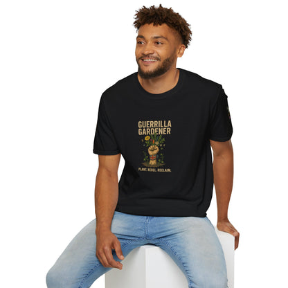 Man wearing a black t-shirt with 'Guerrilla Gardener' text and graphic on a BLACK background