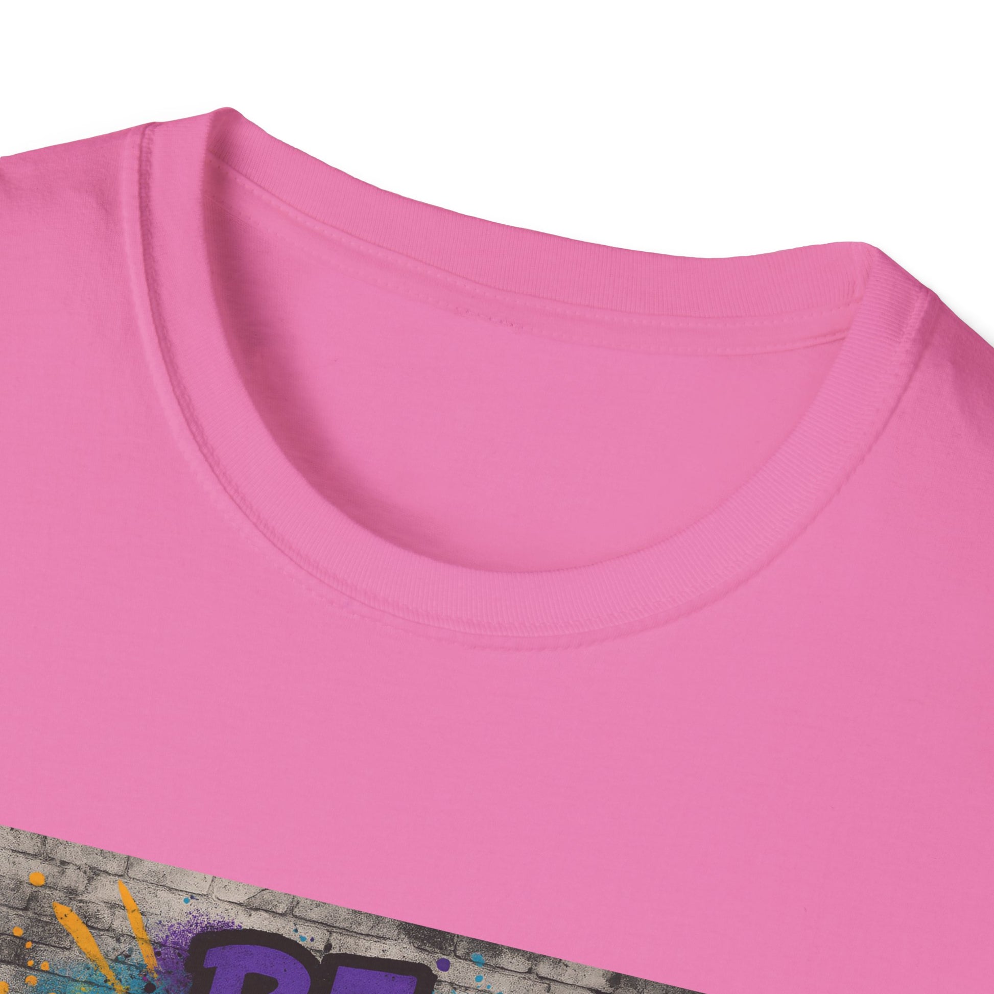 Close-up of a pink shirt with a colorful graphic design on a white background
