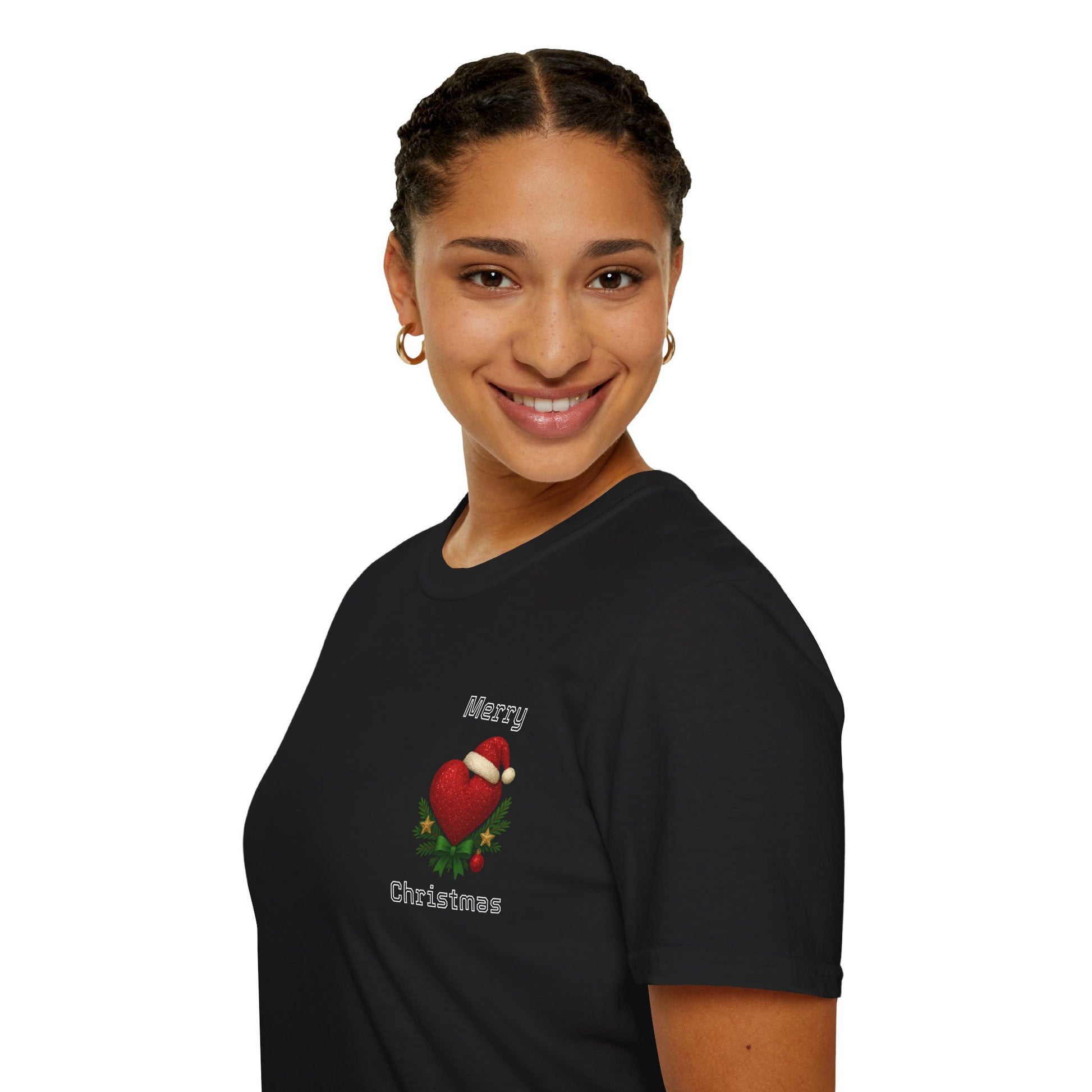 Person wearing a black t-shirt with a Christmas glitter heart design on a white background